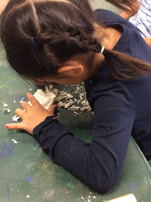 girld whittling